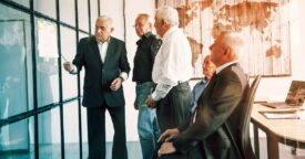 Elderly men in office during a business meeting